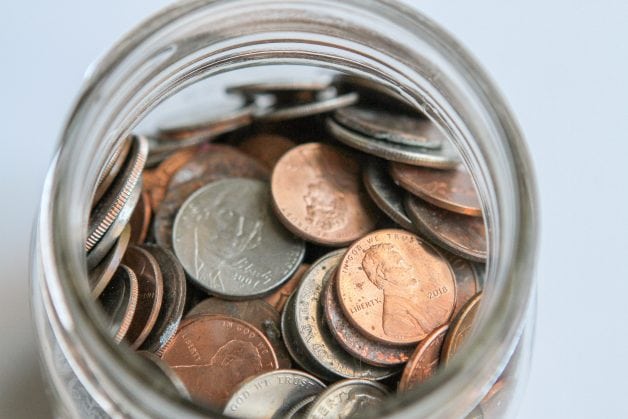 A glass jar of coins.